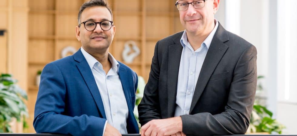 Anu Tayal standing with Neil Lloyd.